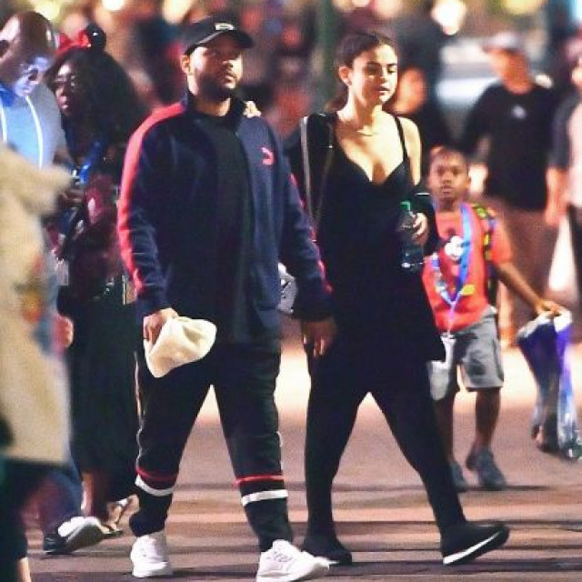 Selena Gomez And The Weeknd Attend Disneyland