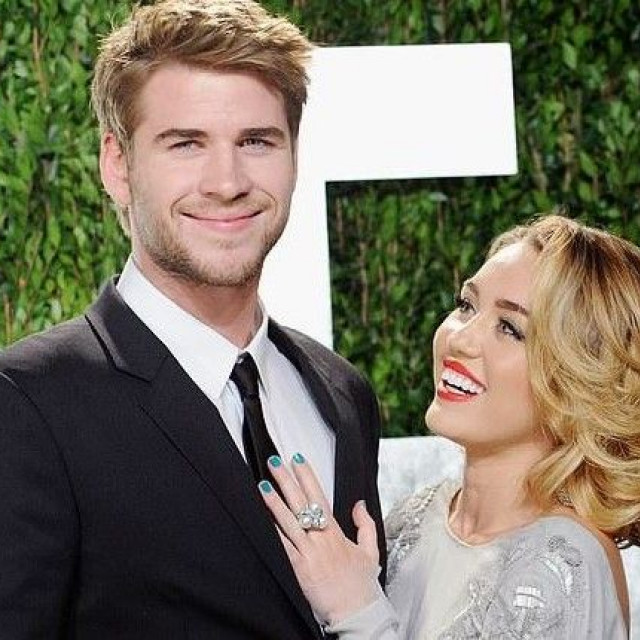 Fireside hugs and kisses: Miley Cyrus officially confirmed the wedding with Liam Hemsworth