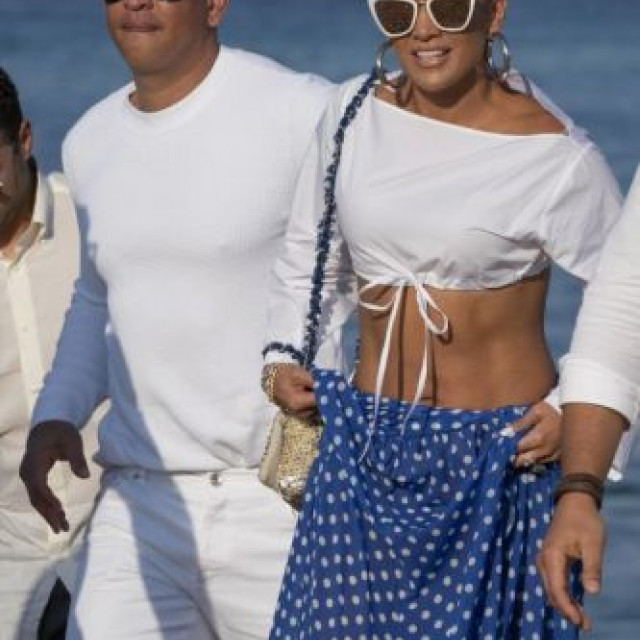 Jennifer Lopez and Alex Rodriguez sunbathe on a yacht