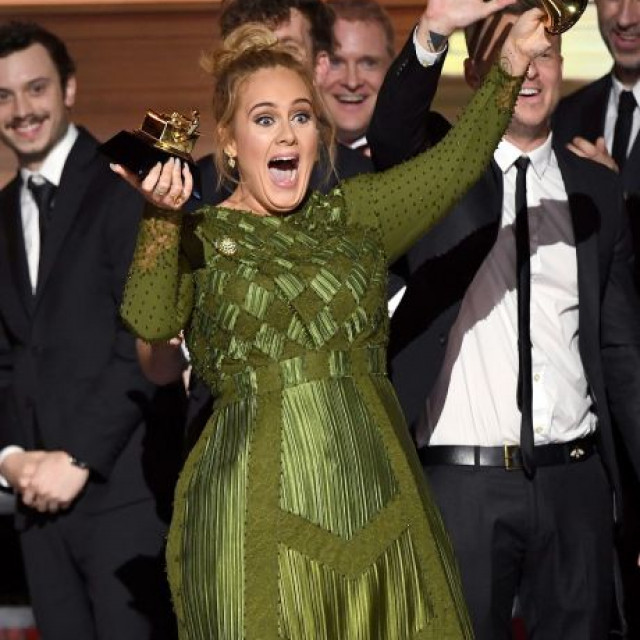 Adele Shares Her Grammy Award With Beyonce