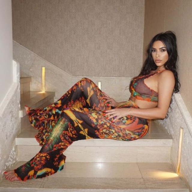 Kim Kardashian flashed a luxurious figure in a spectacular suit